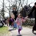 A young girl participates in the parade during Earth Day on Sunday, April 21. AnnArbor.com I Daniel Brenner